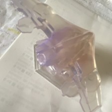 Translucent Purple & Clear Plastic Aircraft Figurine on Clear Hex Base picture