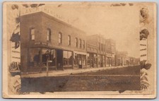 c1907 RPPC Arlington South Dakota Business Block Floral Border ANTIQUE Postcard picture