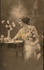 Edwardian Woman with Roses Raphael Tuck & Sons c1900s-10s Vintage Postcard picture