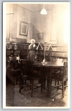 Interior Librarian at Bookshelves at the Library c1920 Real Photo RPPC picture