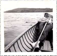 Vintage 1954 Snapshot Photo Woman in Canoe Fishing Lake Black White Wavy Edge picture