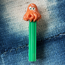 Vintage 70s Orange Octopus PEZ Dispenser Green Stem No Feet Made in Austria 3.4 picture