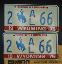 1975 WYOMING LICENSE PLATE PAIR BICENTENNIAL COWBOY HORSE # 2 - 66 picture