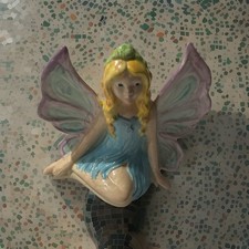 Ceramic Seated Winged Fairy Figurine, Blue Dress with Purple Wings picture