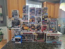 funko pop lot of 20 all sealed except for jaws. Not played with and all in boxe picture