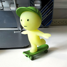 Smiski Glow in the Dark Figurine w/ Green Skateboard Accessory 2023 picture