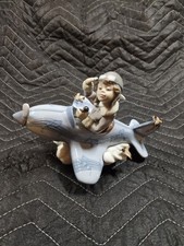Lladro Over The Clouds Porcelain Figurine Boy in Propeller Plane 5697 Retired picture