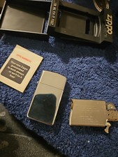 Vintage 1980 Zippo Slim High Polish Chrome Lighter #1610 UNFIRED NOS W/ Box picture