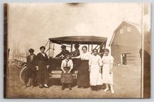 RPPC Langdon ND Family Posing With Touring Car On Farm With Barn Postcard J43 picture