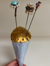 3 antique hat pins and wall hat pin holder picture