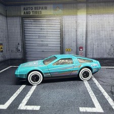 2009 HOT WHEELS ART CARS DMC DELOREAN T BLUE DIECAST 2 3/4
