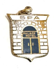 Vintage Palace Hotel Spa Enamel Brass Charm picture