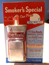 Old Vintage 1960's Windproof Cigarette Lighter & Can Of Fluid Never Been Opened picture