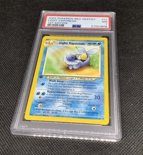 PSA 7 Light Vaporeon First Edition 52/105 Uncommon Neo Destiny 2002 Pokemon Card picture